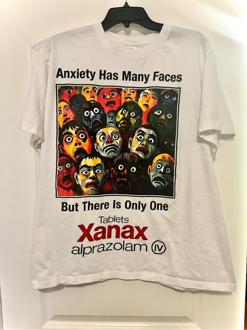 Vintage White Tee with Multicolored Faces Graphic